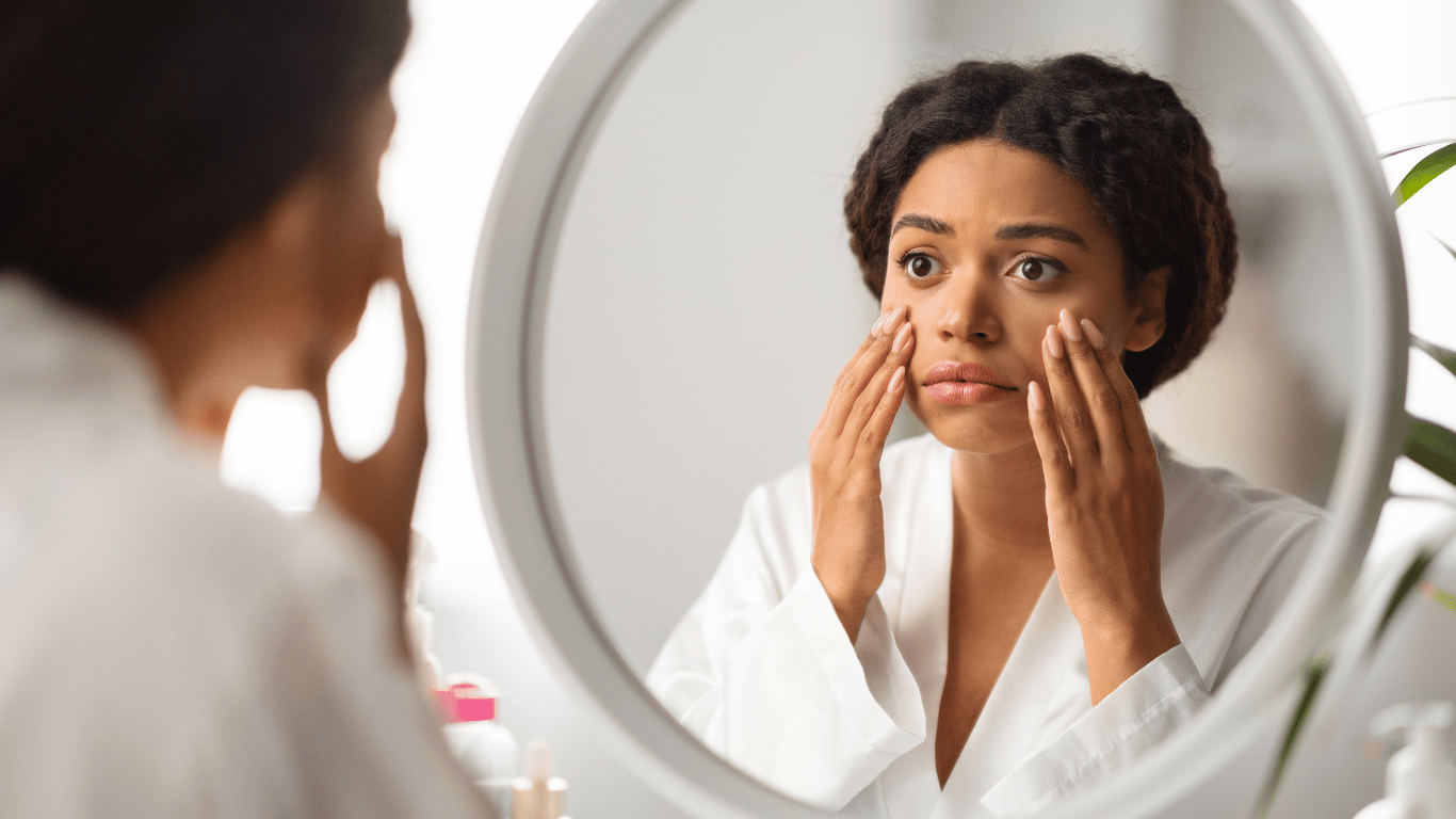 A millenial woman demonstrates ways to brighten dull skin naturally