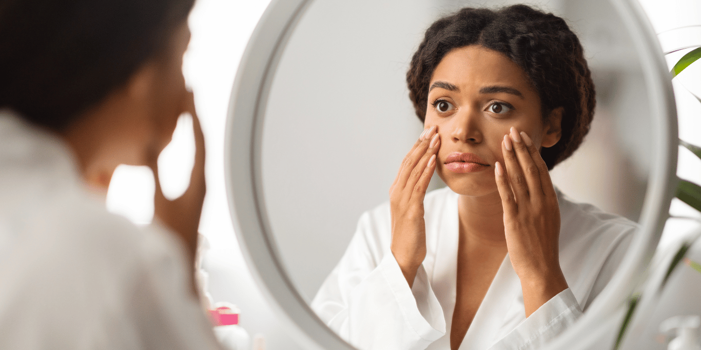A millenial woman demonstrates ways to brighten dull skin naturally